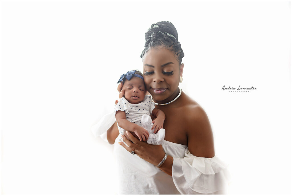 Brooklyn Newborn photography session baby girl in moms arms