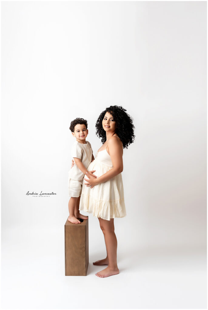 Mom and son showing why are maternity photos worth it