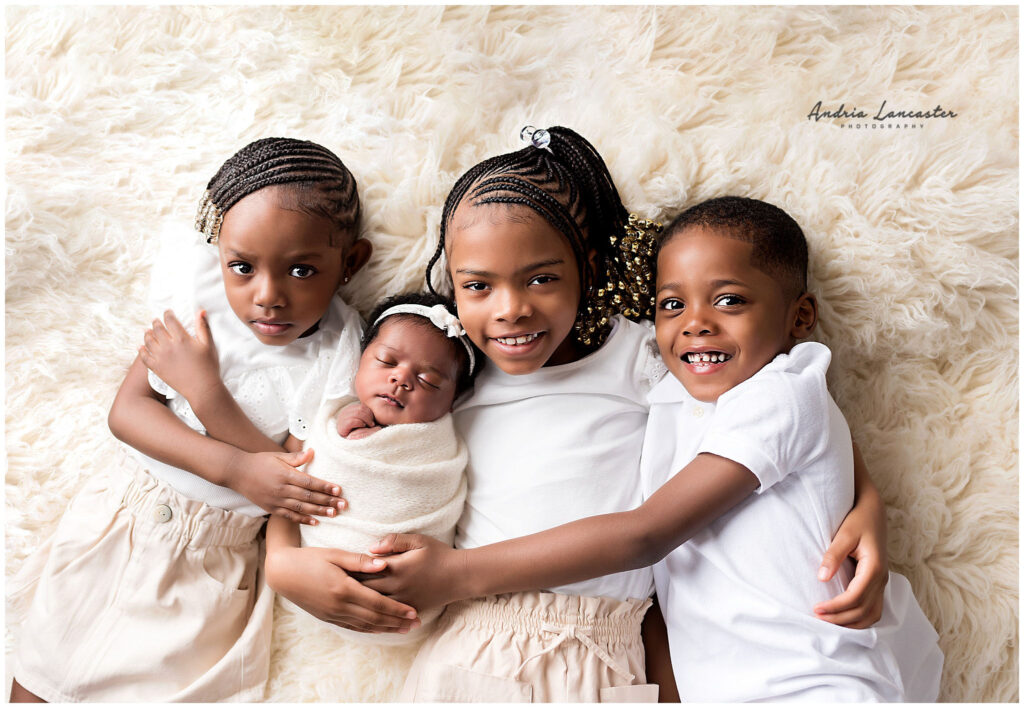 newborn portraits with three siblings 2
